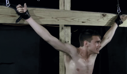 derekisme:  stretched, crucified, his ass invaded by a dildo … at least that nice boy Jared will jerk him off  