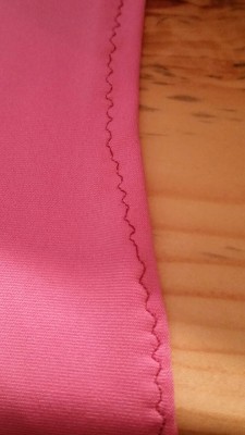keiwiiii:  Just a nice little  tip if you didn’t know,  If you need to sew spandex or other stretchy materials  but don’t have the money for a serger, buy a stretch needle.  The photo on the left was sewn with a universal ball point needle and the