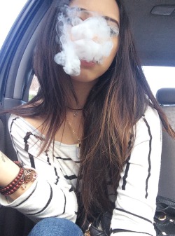 novac0caine:Smoking in the car while my bf is yelling at some kid lol 