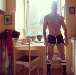 Men in rugby and footy socks