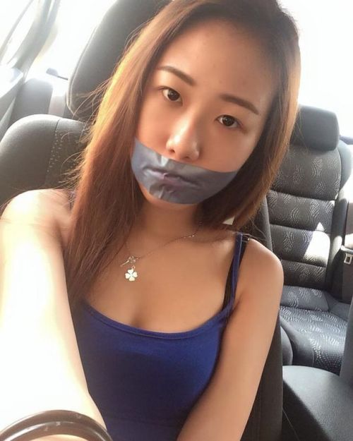 Adrian girl fake tape gagged