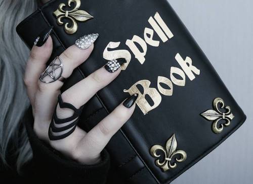 Spellbook by #skinnybags & black ring by #rogueandwolf Both Available at WWW.PINKMILKSWEDEN.COM 
