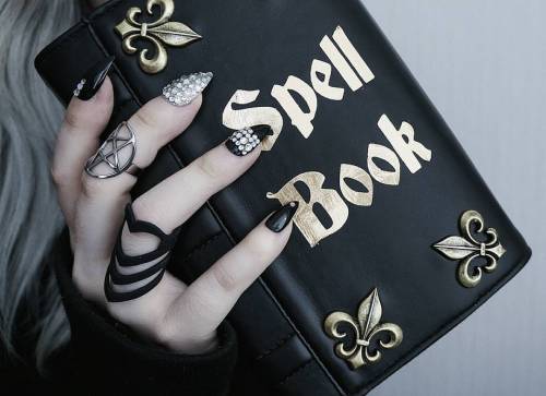 Spellbook by #skinnybags &amp; black ring by #rogueandwolf Both Available at WWW.PINKMILKSWEDEN.