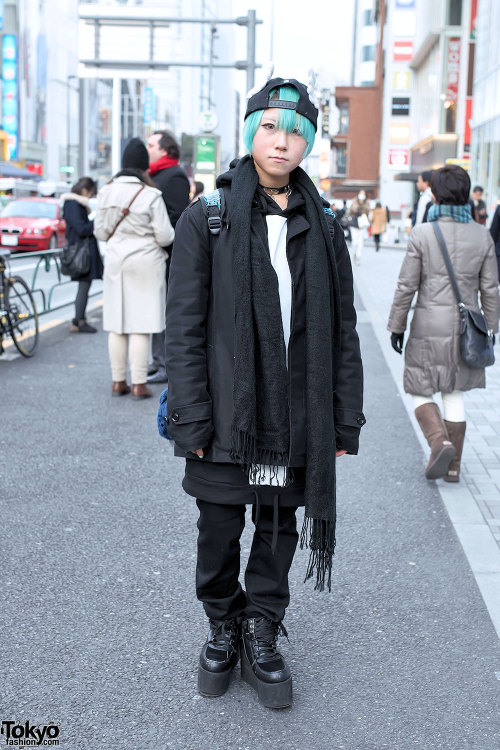 Japanese cosplayer Watson on the street in Harajuku wearing a black jacket over a Monomania hoodie, 