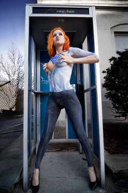 nerdybodypaint:  Body paint of Supergirl changing in a phone booth