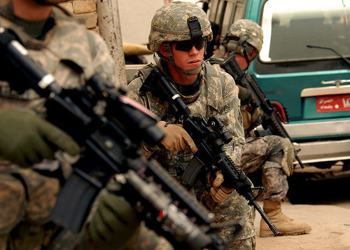 militaryandweapons:  Iraqi Police and 4th ID Soldiers Patrol the Streets of Abu Tshir by DVIDSHUB on Flickr.