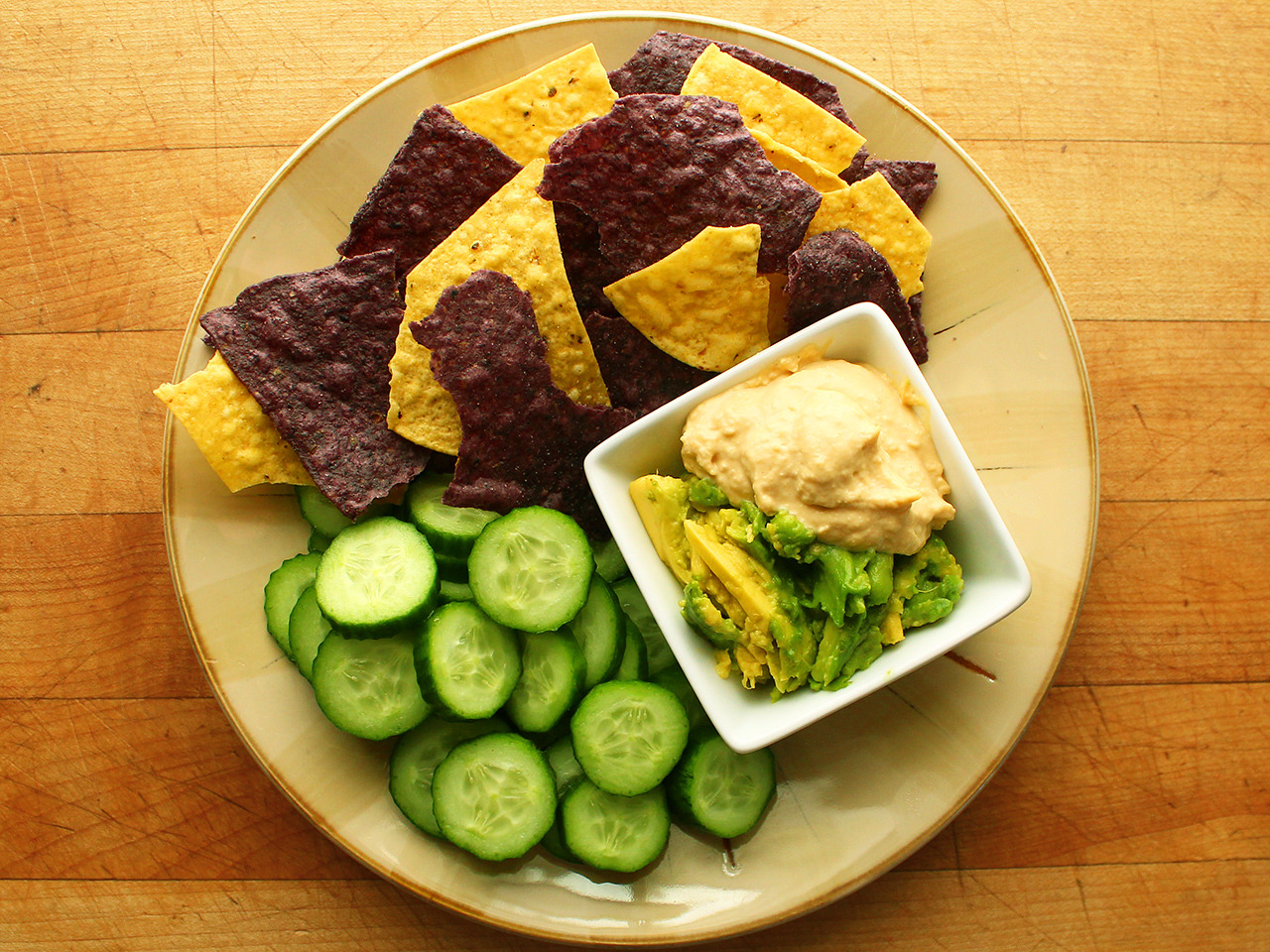 garden-of-vegan:  Blue &amp; yellow organic tortilla chips and cucumber slices