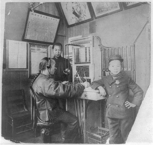 First Chinese telephone operator in Chinatown, San Francisco, taken between 1900 and 1930. Unidentif