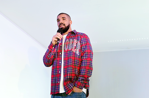 celebritiesofcolor:   Drake performs before the game between the Toronto Raptors and the Cleveland Cavaliers on November 25, 2015 at the Air Canada Centre in Toronto, Ontario, Canada. 