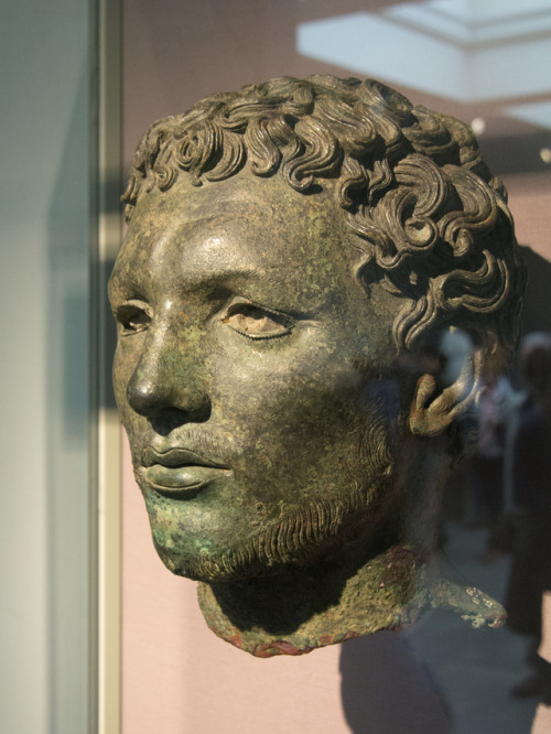 Bronze head of a man, thought to be a north African.  Artist unknown; ca. 300 BCE.  Found beneath th