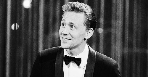  Tom Hiddleston onstage presenting the Best New Play Award at The Laurence Olivier