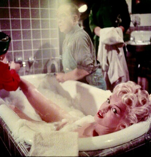 talesfromweirdland:“Last minute make-up for Marilyn’s all-important big toe is applied in tub… bubbl