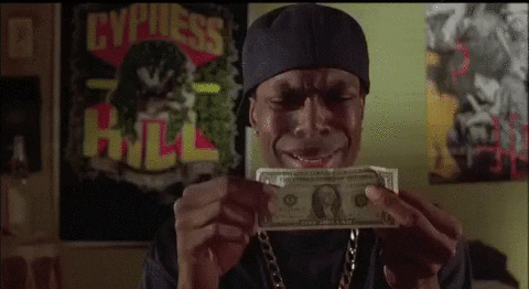 Smokey looks at a dollar bill and says "This ain't enough!"
