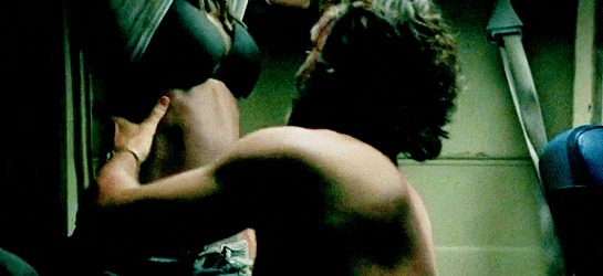 What I love about this scene is that Michonne is attempting to remove her top, but Ricky can’t wait. So he grabs her waist and kisses her stomach.
Damn…