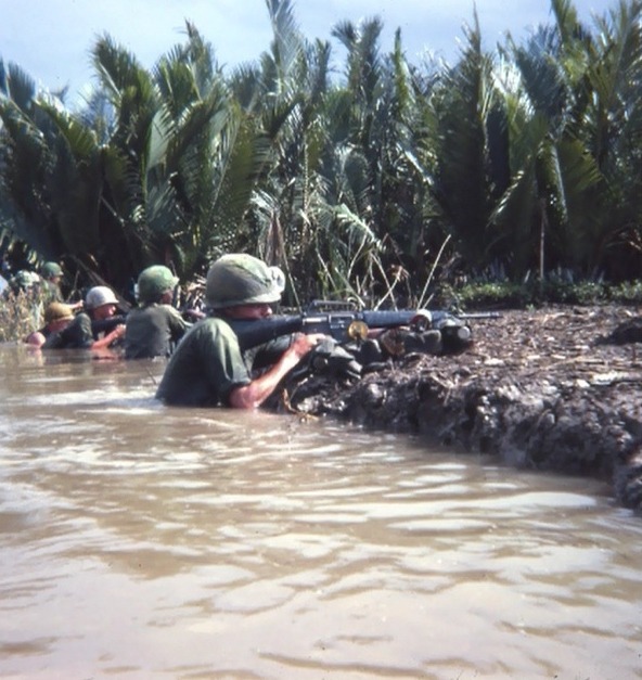 vietnamwarera:   Caught in midst of canal crossing, members of 3rd Plt. CoB 2/3 199th