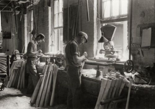 Craftsmen making baseball bats in a Louisville Slugger factory (1932)