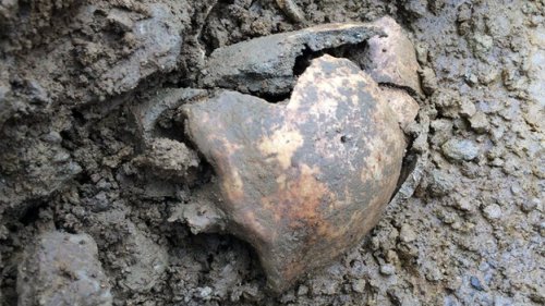 From the BBC:The tombstone was found near skeletal remains thought to belong to the person named on 