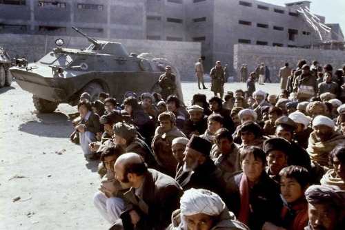 Afghans wait outside the Pul-e-Charkhi prison in central Kabul(January 14th, 1980), days after the M