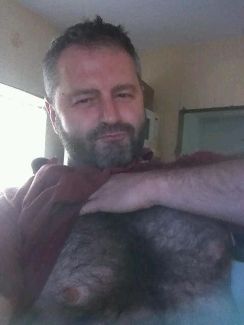 graybeards:  “You like a hairy chest?” I smiled as I read his message and I replied, “Fuck yeah”The picture flashed onto my screen almost instantly. He had his shirt pulled up, revealing a thicket of thick, dark fur on his big chest, and a smirk