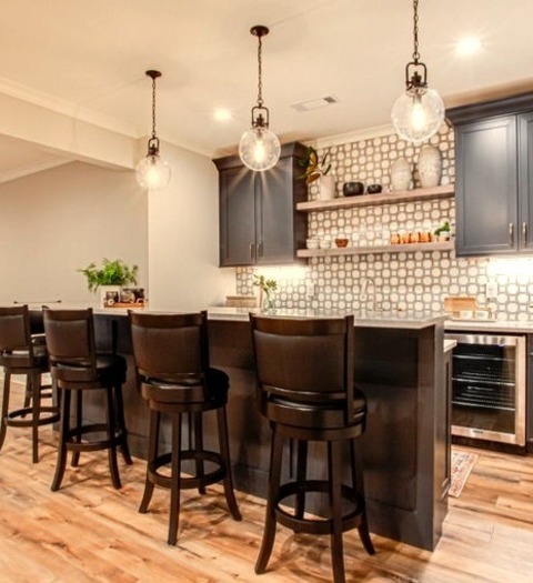 Walk Out AtlantaExample Of A Large Transitional Walk-out Laminate Floor And Beige Floor Basement Design