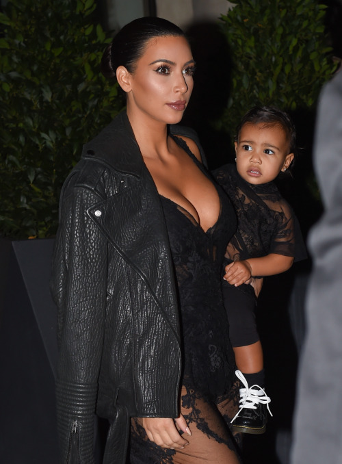 kimkanyekimye: Kim &amp; North leaving their hotel to head towards the Givenchy SS15 RTW show in