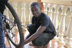 unconsumption:  Meet Elliot Mwebaze, a telecom-engineering graduate who has made  charging phones much easier by lessening their dependence on  electricity. Over a period of nine months he developed a device that  enables phones to charge using a bicycle