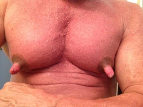 He is one very handsome man and with exceptional pecs and awesome nips!  WOOF