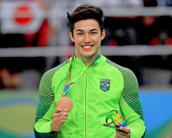 leocuccittini:  Arthur Mariano of Brazil celebrates on the podium of the men’s floor event final of the Artistic Gymnastics during the Rio 2016 Olympic Games on August 14, 2016