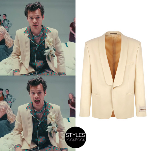 In the Late Night Talking music video, Harry is wearing a Gucci ivory single-breasted jacket over hi