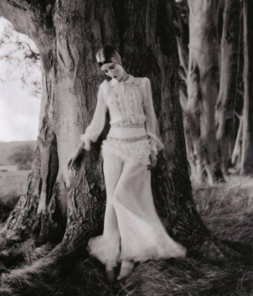 Edward Steichen -Model Marion Morehouse (dress by Kargère) // masks by the illustrator W.T. B