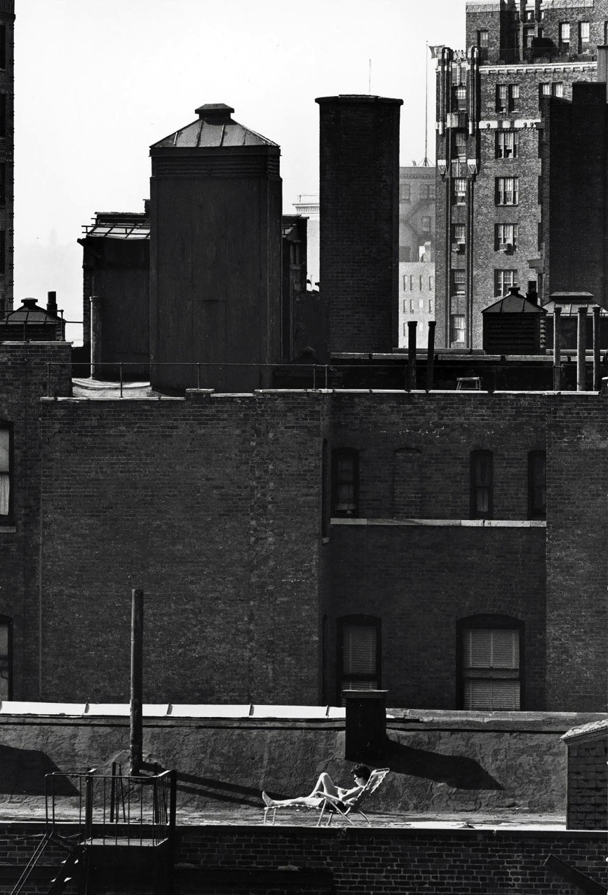 luzfosca:  André Kertész Untitled [Woman sunbathing on roof reading], 1964 From On