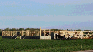 Time lapse of Amish people building a barn.