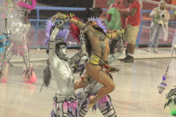 Topless at a Brazilian carnival, by Carlos