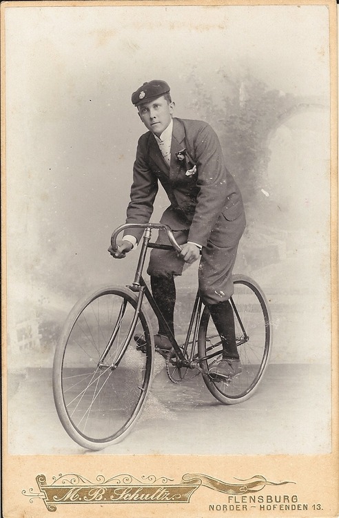 Early cyclist fashion, 1884. Flensburg, Germany. Source