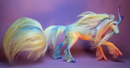 quequinoxart:  “Borealis” is a one of a kind, hand made kirin sculpture. She is made from polymer clay over wire and foil and painted in acrylics. Her hair is cashmere goat fur and she has light blue resin eyes. She is about 13 inches long in total