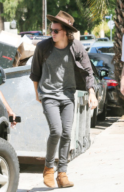 direct-news:  HQ’s - Harry Styles seen out and about in Los Angeles. Harry seen wearing jeans with a grey t-shirt and brown boots and he finished the look with a brown hat and dark sunglasses. 09/02 