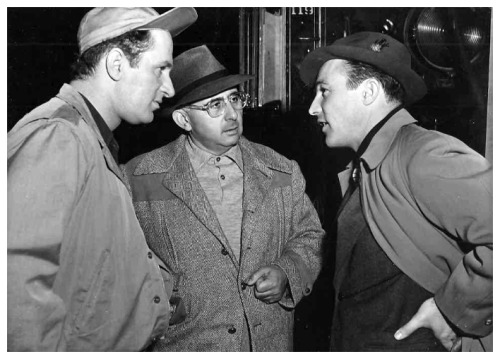 THE BOYS … Keenan Wynn, Norman Taurog and Gene Kelly get together for a chat when Kelly visit