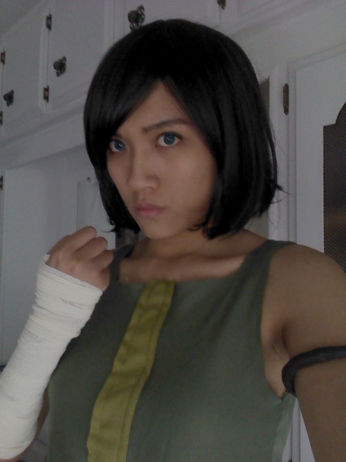 korra-sensation-domination:  jazztea6:  Some poor quality cell pics of my Earthbending Korra outfit.  I still need to style the wig, hem the edges, and finish the bottom part of the top. Anyone else think of Destiny’s Child’s music video for “Survivor,”