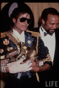 verajaynes:   Michael Jackson and Quincy Jones photographed at the 26th annual Grammy Awards in 1983. That night, Michael made history winning eight Grammys, the most of any performer in a single night.  