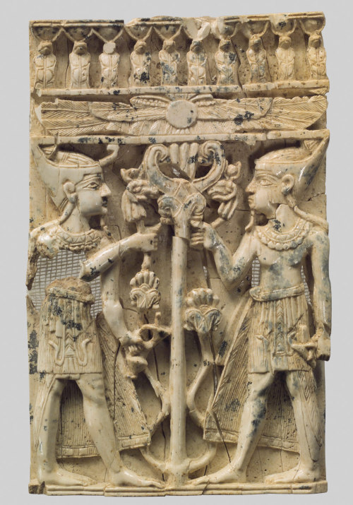 dwellerinthelibrary:At the Met, an ivory plaque from the city of Nimrud. It’s Assyrian (specifically
