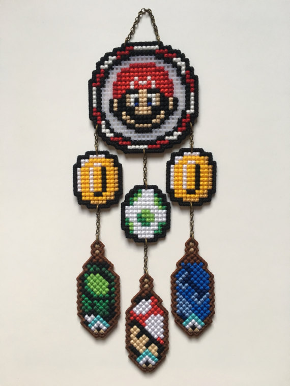 retrogamingblog:Cross-stitch Nintendo Dreamcatchers made by TheWorldofNerdArt