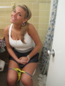 Girls Sitting on the Toilet