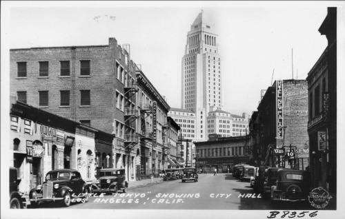 Little Tokyo street scene with City Hall as a backdrop, 1937.