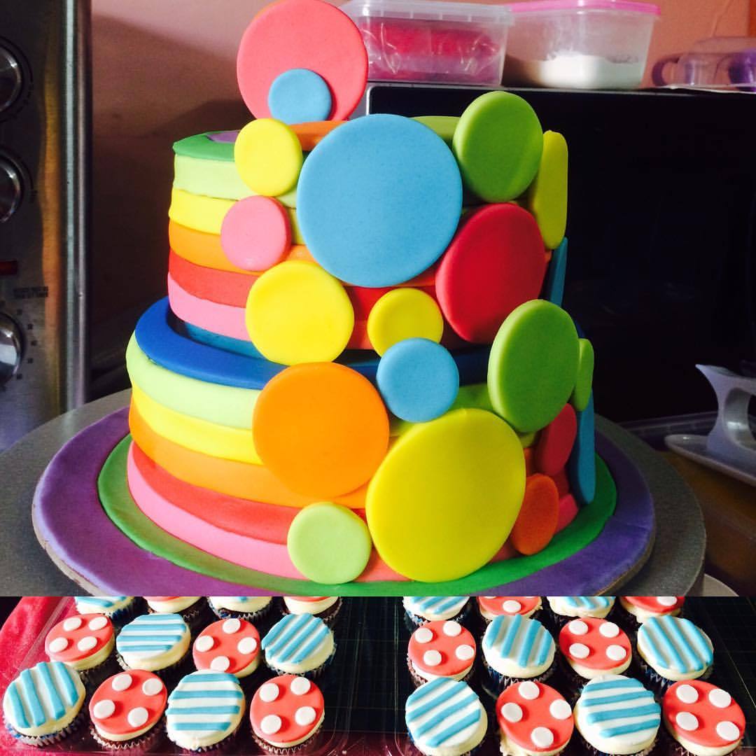 hutaib:  Polka dots and stripes themed birthday cake and custom mini cupcakes for