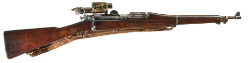 A Springfield Model 1903 bolt action rifle with Model 1913 Warner and Swasy 5.2 power telescopic sig