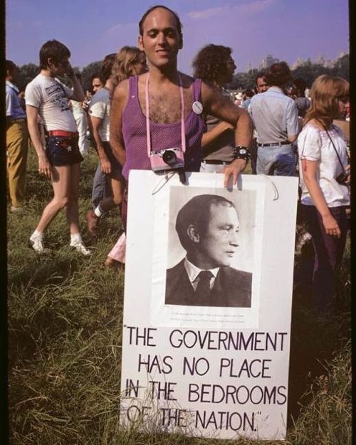 Marcher with Pierre Trudeau sign, Second Annual Christopher Street Liberation Day, Central Park, New