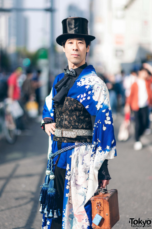 tokyo-fashion:  Karumu on the street in Harajuku wearing a vintage Japanese kimono with a ruffle top, lace corset, top hat, vintage briefcase, tassels belt, and New Rock cowboy boots. Full Look