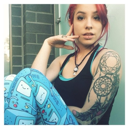 Who wants to play video games?! #bmo #adventuretime #blackmilkclothing #girlswithtattoos #dreamcatch