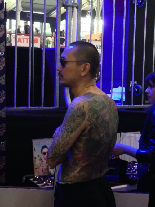 Shige’s trying sunglasses on after winning first price for best tattoo at the Mondial du Tatou