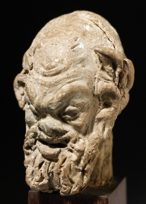 Terracotta head of a bearded satyr.  Artist unknown; 1st or 2nd cent. CE.  From Alexandria, Egypt; n